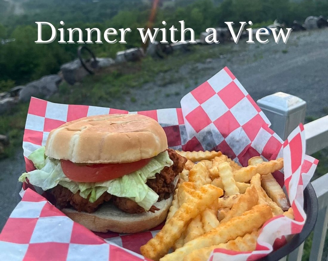 Burger and fries on the overlook at sunset