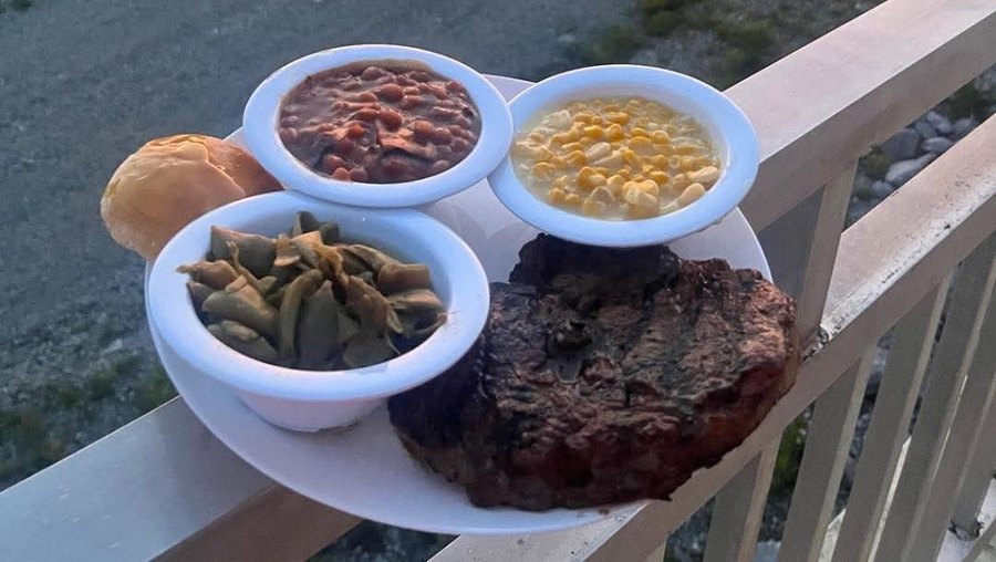 12 oz ribeye with sides, plated on the overlook railing