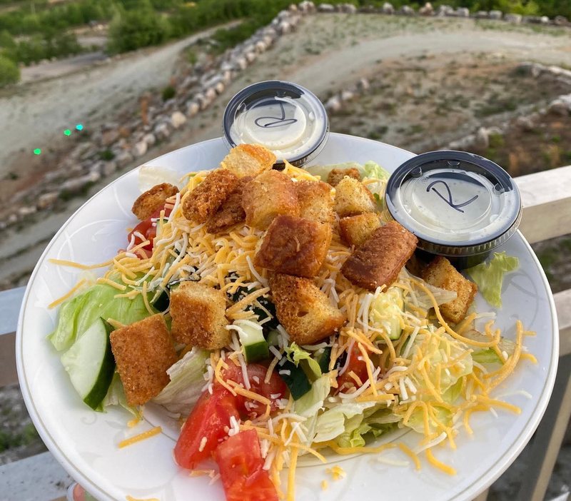 Fresh chef salad with homemade croutons, overlooking the mountain